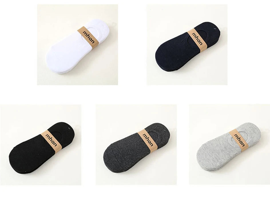 A collection of multi-colored breathable cotton ankle socks in white, black, gray, and olive green.