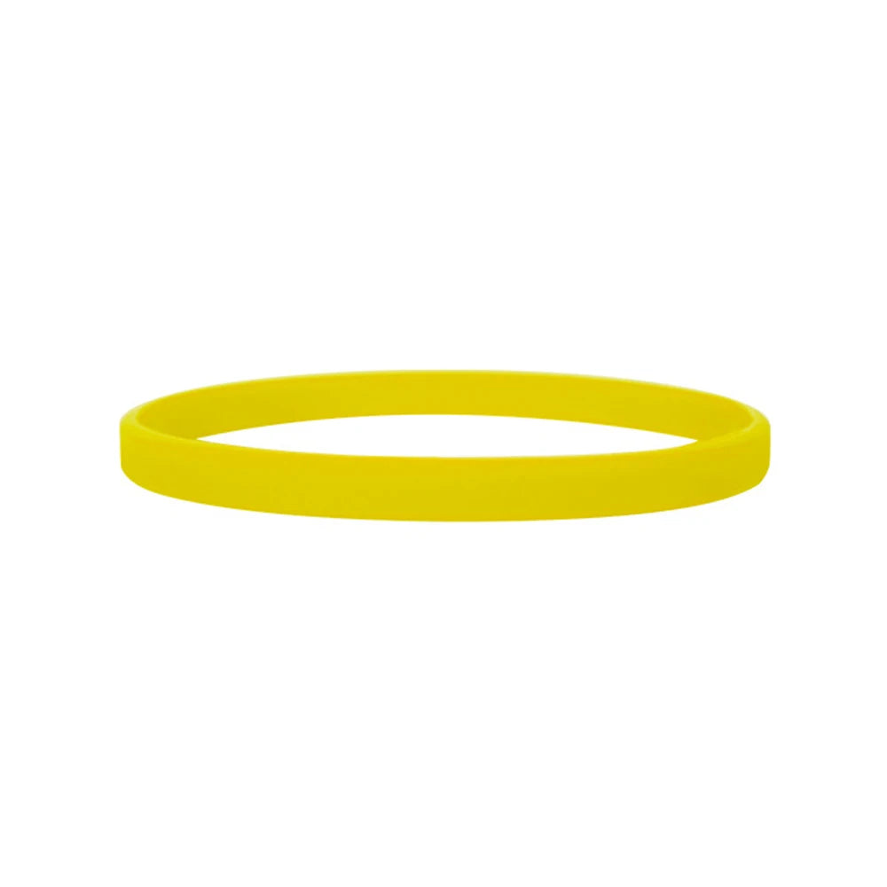 A bright yellow silicone wristband for fitness or fashion.