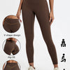 A model wears dark brown high-waist yoga leggings highlighting the V-shape design and hip lift features.