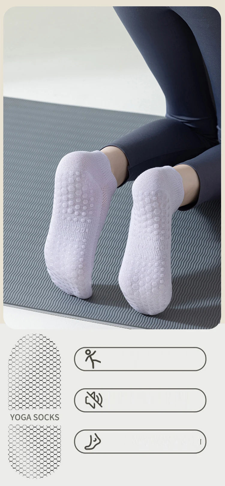 A pair of light purple yoga socks worn on a foot, displayed against a gray mat.