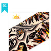 Close-up of black and orange arm warmers featuring a stylized woman design.