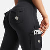 A close-up of black high-waisted flared fitness pants featuring multiple pockets and hardware.