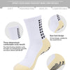 White sports socks featuring a rear heel design and anti-skid dispersing sole for comfortable football play