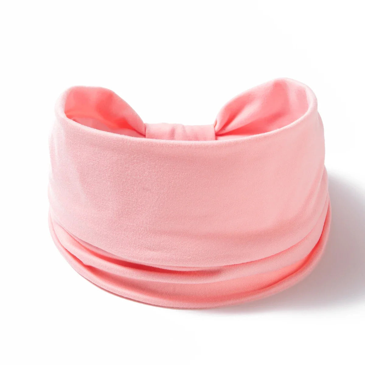 A soft pink boho wide headband hair wrap for women shown against a white background.