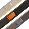 A close-up view of an adjustable nylon strap for a sports watch, showing various colors and textures.