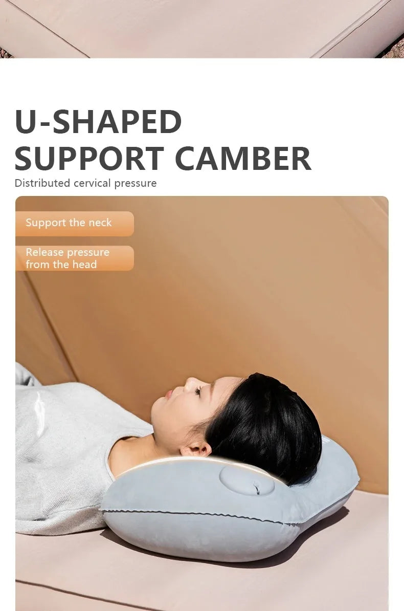 A person is lying down using a U-shaped support camber pillow for neck and head support.