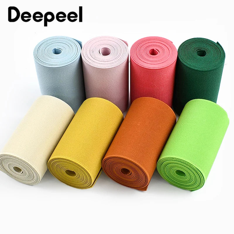 Rolls of colorful adjustable elastic bands for sewing and decoration in various shades of pink, red, green, yellow, and beige