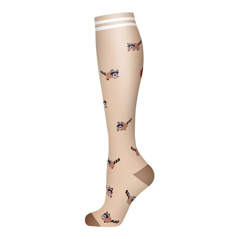 A close-up of beige compression socks featuring a pattern of small animal figures.