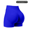 A bright royal blue compression fit tummy control fitness short for women.