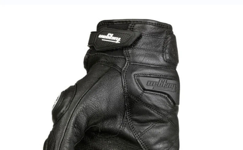 Black genuine leather motorcycle riding gloves shown in a close-up view.