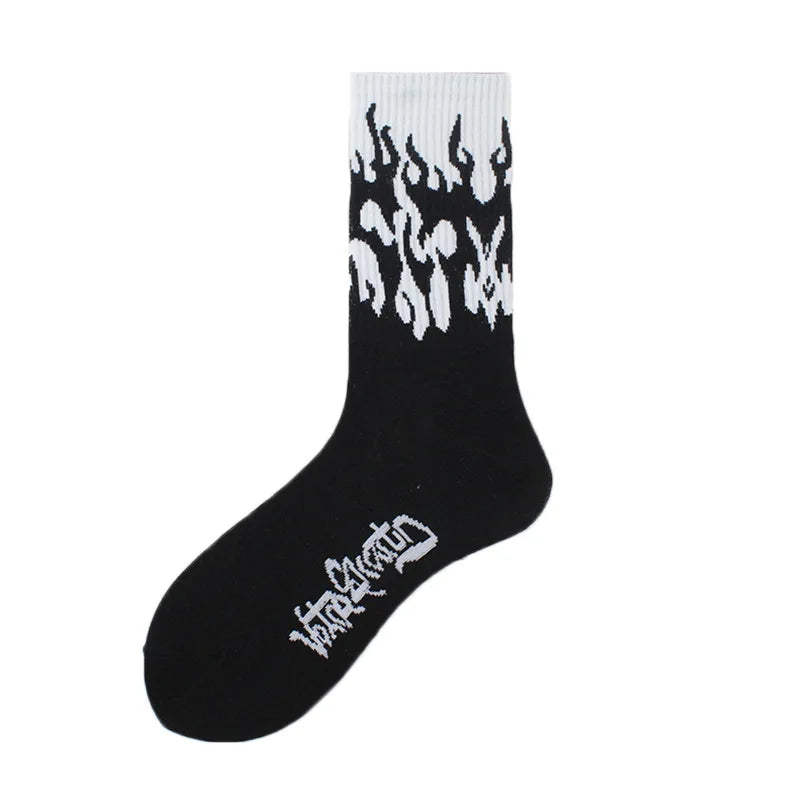 Black novelty socks featuring a white flame pattern design