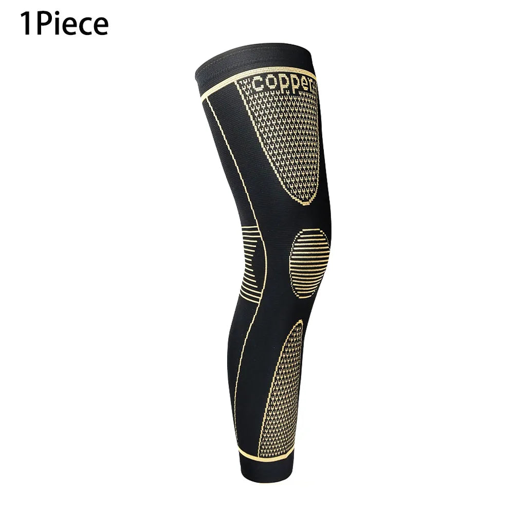 Black full leg compression sleeve with gold mesh detailing on the calf area