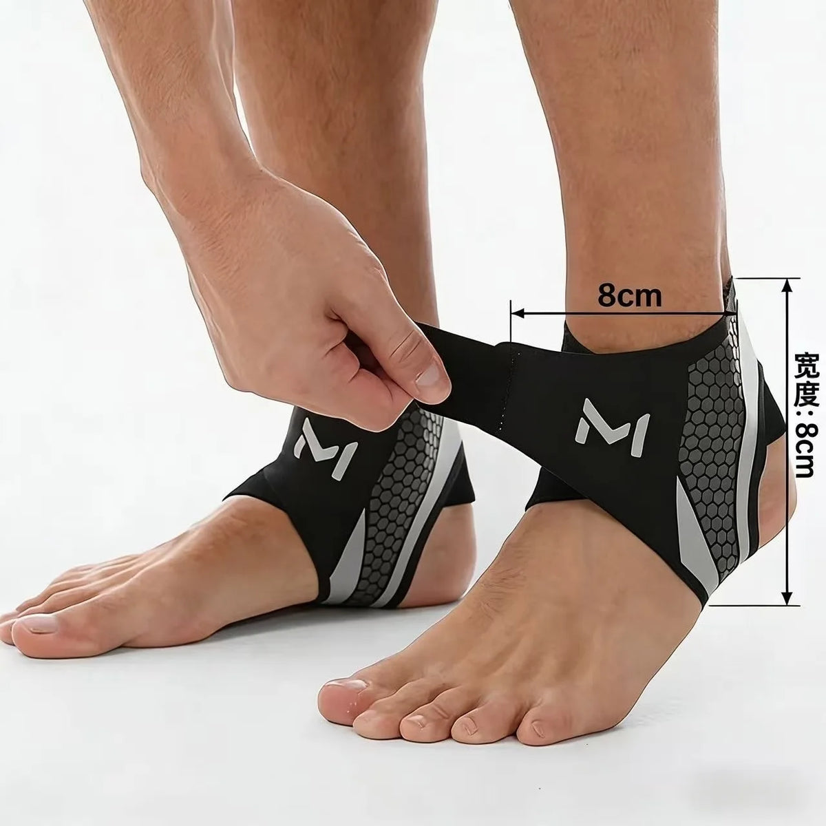 A person's foot is shown wearing a black knit ankle brace for support and injury prevention.