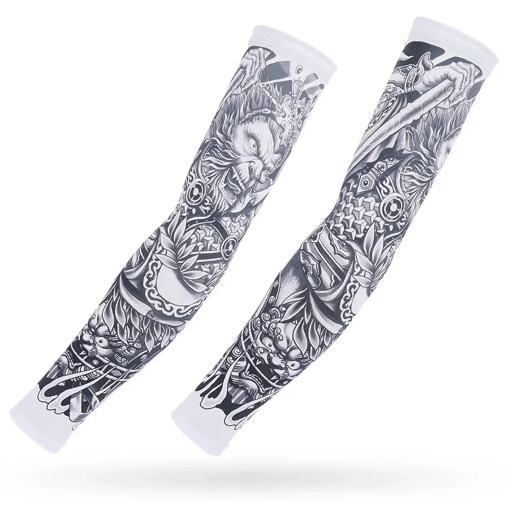 A pair of black and white ice silk arm sleeves featuring intricate dragon and warrior designs for sun and heat protection.