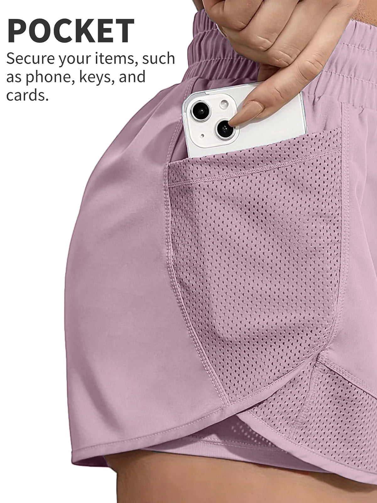 A close-up of a light purple athletic short featuring a mesh pocket used to secure a smartphone.