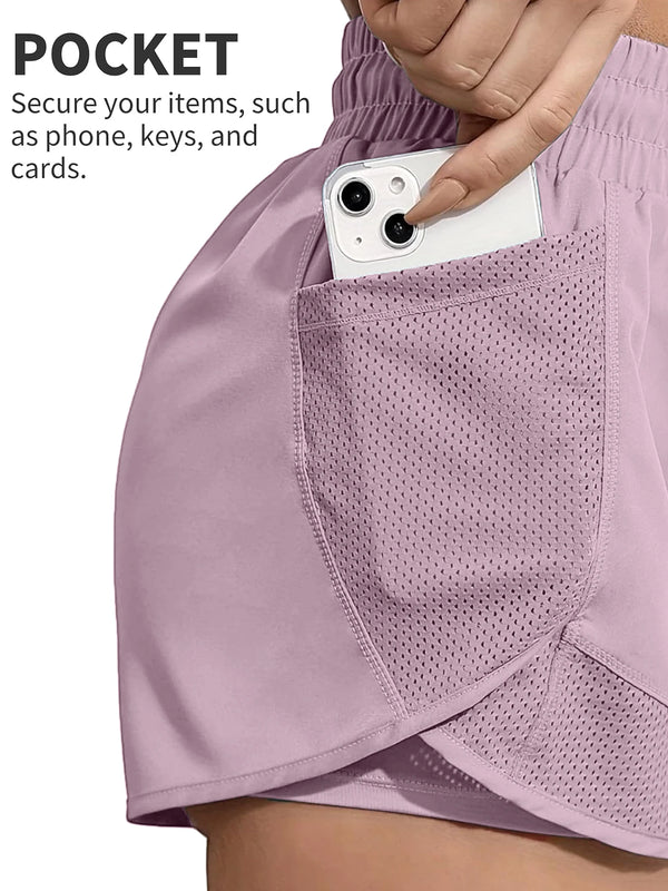 A close-up of a light purple athletic short featuring a mesh pocket used to secure a smartphone.