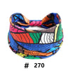 Colorful boho cotton turban headbands featuring abstract patterns in blue, orange, pink, and green.
