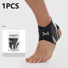 A person's foot is shown wearing a black and gray ankle protector for plantar fasciitis.