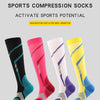 A collection of five sports compression socks in various colors including black pink white and yellow