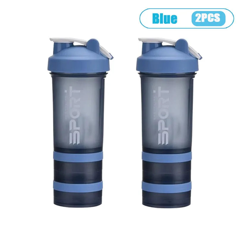 A pair of blue 3-layer protein shaker bottles with handles shown side by side.