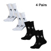 Vier Paar schwarze rutschfeste Sportsocken zusammen