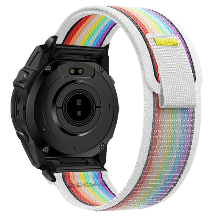 A black Garmin sports watch with a multi-colored nylon strap is shown from the side.