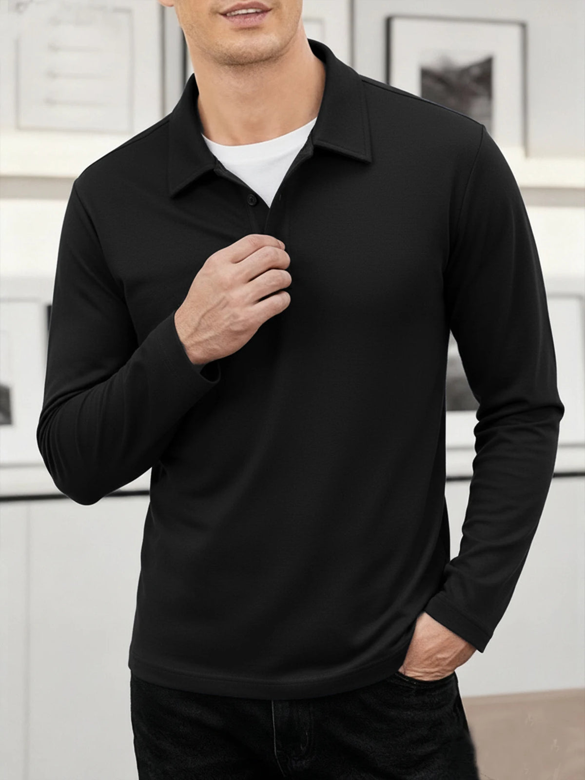 A man wearing a black breathable casual polo shirt and dark pants.