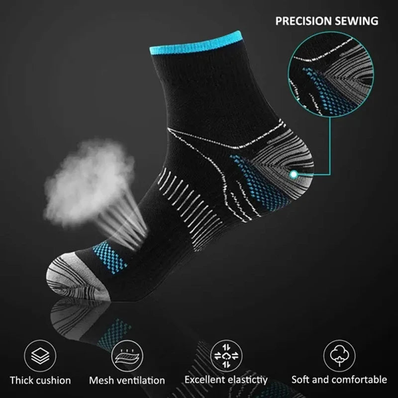 Close-up of black ankle compression socks showing precision sewing and features like thick cushion, mesh ventilation, excelle