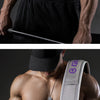 A muscular man wears a gray fitness lifting belt with purple accents, demonstrating its use for core and lumbar support.