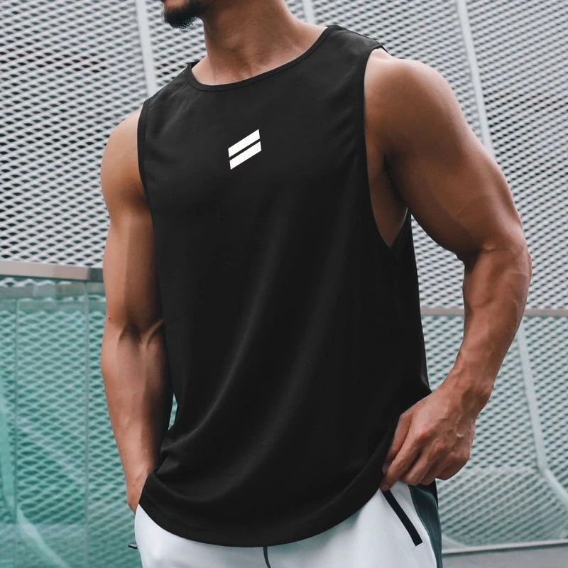 A man wearing a black sleeveless sports tank top with a white stripe logo, standing outdoors.