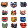 A collection of colorful bohemian stretch cotton headbands featuring geometric patterns and embroidery.