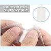 A hand is tearing a piece of light pink athletic finger tape, demonstrating its serrated edge design.
