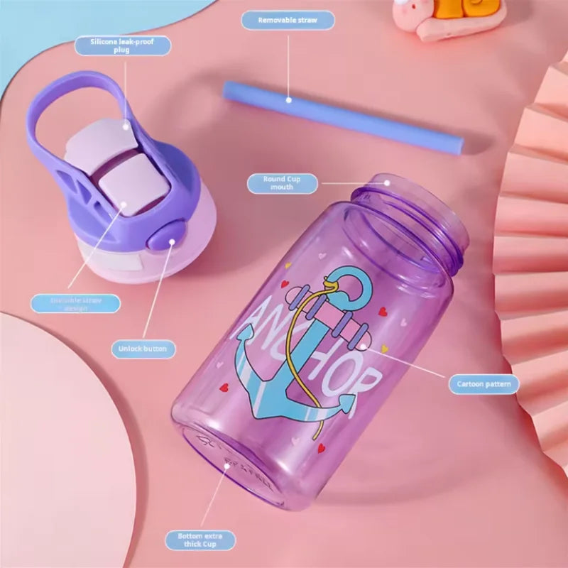 A purple cartoon straw sippy water bottle with a removable straw plug and a silicone leak-proof lid is shown on a pink backgr
