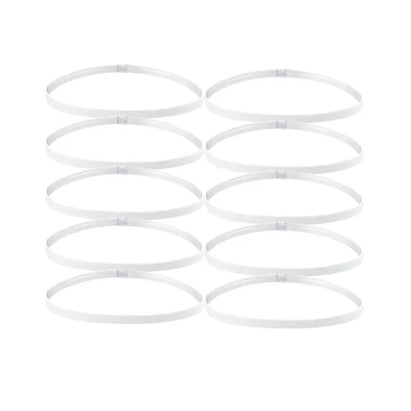 A set of five white multi-functional elastic sports headbands laid out in a row.