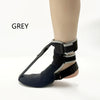 Grey comfortable night splint socks worn on a foot.