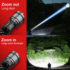 Demonstration of a zoomable LED headlamp showing a long shot and a zoomed-in floodlight beam in a natural environment.