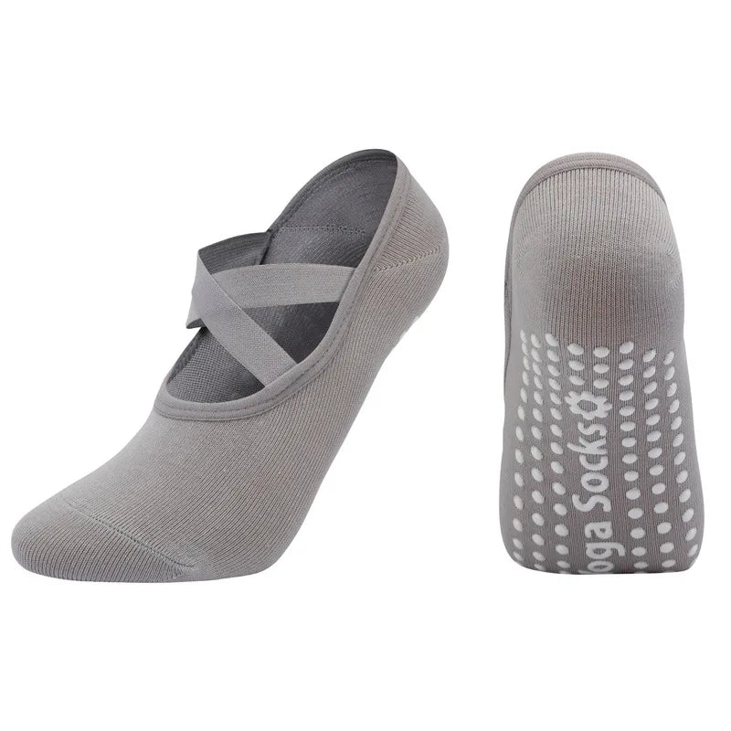 Gray silicone anti-slip pilates and yoga socks shown from the side.