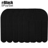 A set of five black kinesiology tapes for sports recovery.
