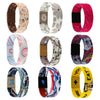 A collection of various stretch silicone wristbands featuring floral and abstract patterns in earthy, pink, and multicolored 