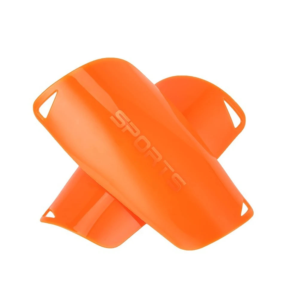 Orange durable soccer shin guards shown from the side.