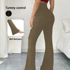 A model wearing brown high-waisted yoga leggings with flare details, demonstrating tummy control and bell bottoms.