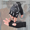 A hand wearing a black sports glove with a protective pad is shown against a blurred background.