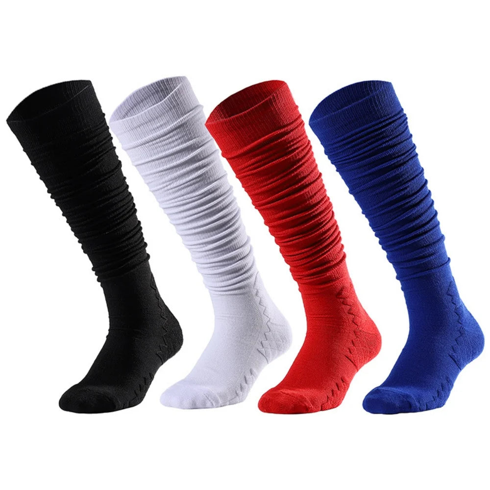 A set of four knee-high sports socks in black, white, red, and blue.