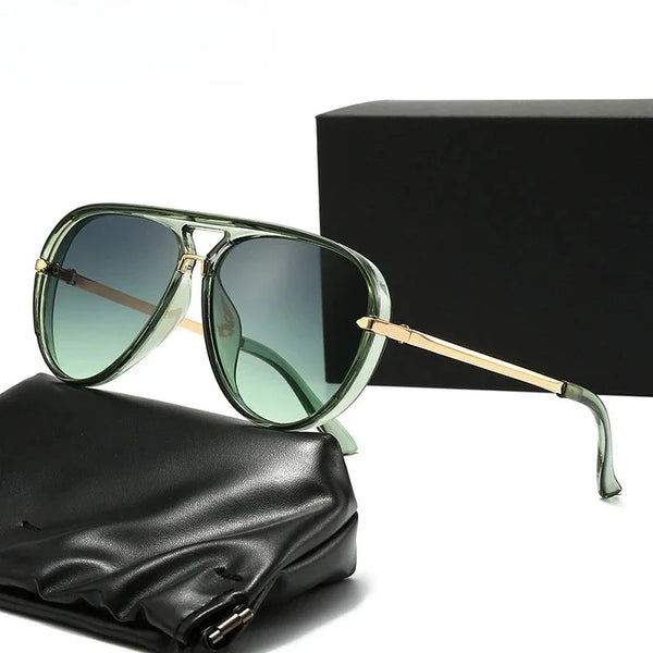 A pair of light green fashion protective sunglasses resting on a black leather pouch next to a black box.