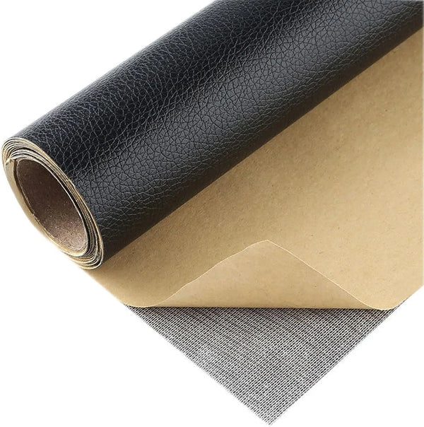 Roll of black leather repair patches placed on a piece of brown paper and a gray textured material.