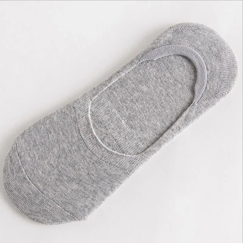 Chaussettes invisibles en silicone gris et respirantes pour hommes, vue de dessus