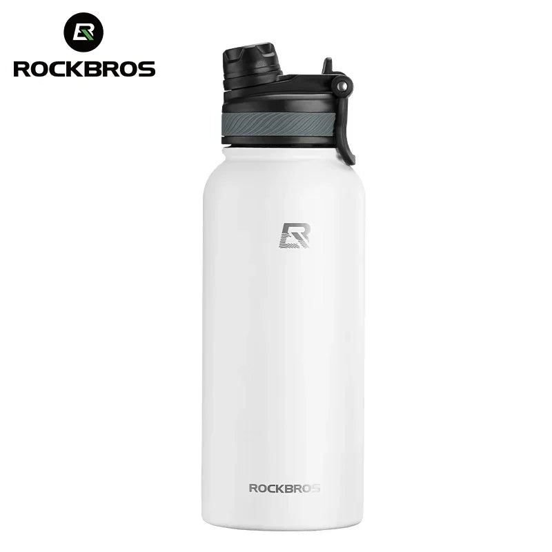A white insulated stainless steel thermal water bottle with a black cap and a silver Rockbros logo.