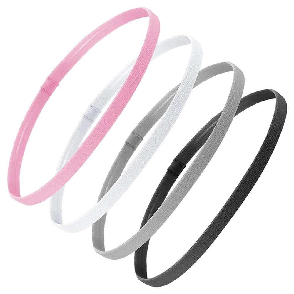 A pack of four non-slip elastic sport headbands in pink, white, and gray for workout and yoga.