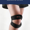 A person wearing a black pressurized knee support sleeve during a scenario show.