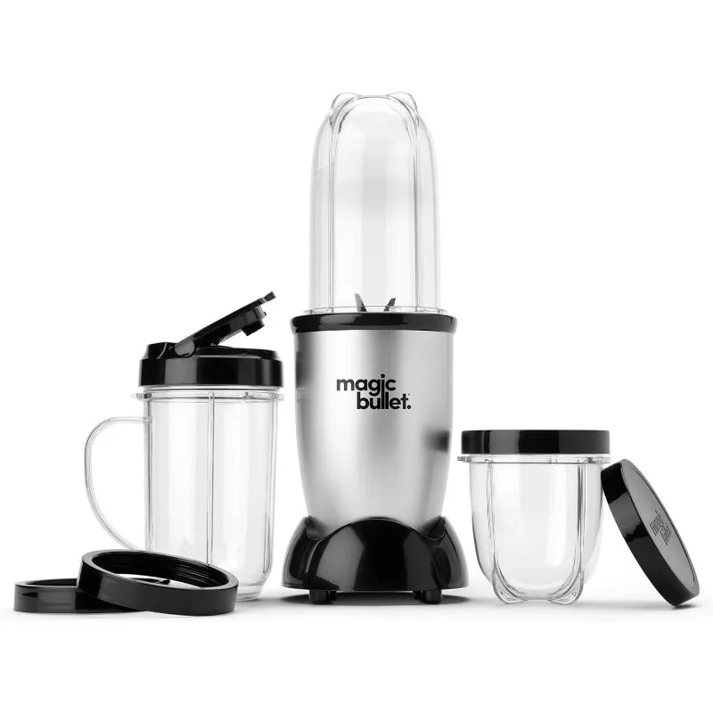 Set de licuadora Magic Bullet plateada y negra con vaso y accesorio de cuchilla transparente.
